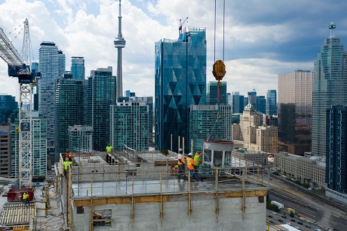 Menkes Developments Ltd-Menkes Celebrates Topping Off 100 Queens