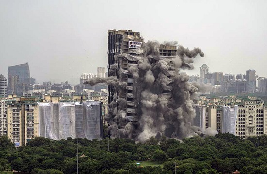 India demolishes towers