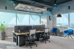 An image of Acoulite's Dubai office, with sound waves flowing through the space, representing the workplace's new biophilic or nature-based soundscapes.