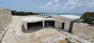 Construction at The Summit.  Almost complete sustainable Villa. Carved into the limestone hillside.